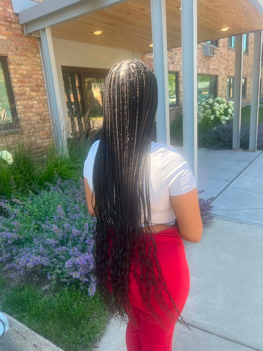 Two-strand twists styled at Mariame Hair Braiding Minneapolis.