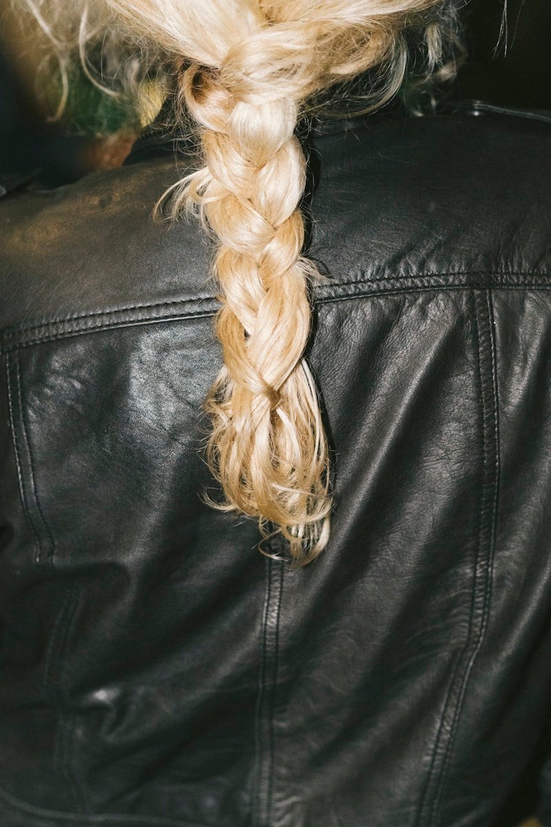 Professional hair braiding salon environment.